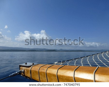 Relaxing picture. View from a wooden sailboat, yacht.