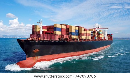 Large container ship at sea - Top down Aerial image Royalty-Free Stock Photo #747090706