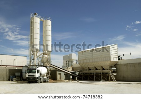 Industrial Cement Processing Plant Royalty-Free Stock Photo #74718382