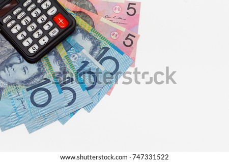 calculator and various australian money(AUD) isolated on white