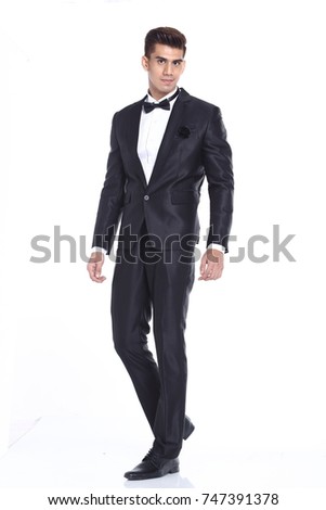 Full Length Snap Figure, Business Man Stand in dark Blue Black Suit pants and shoes, studio lighting white background isolated, Asian Male Model happy smile
