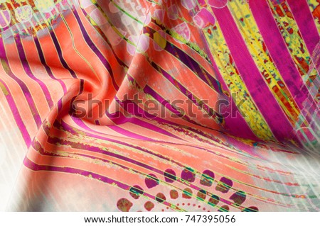 Texture background image, Silk fabric with abstract pattern. Colorful silk fabric close-up. Filtered toned image in instagram style. Photo of silk fabric. Textile design. Painting fabrics
