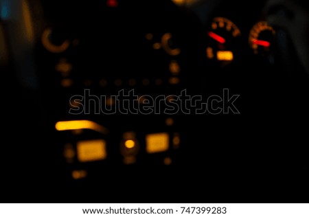 Blur car monitor in dark, automobile digital display 