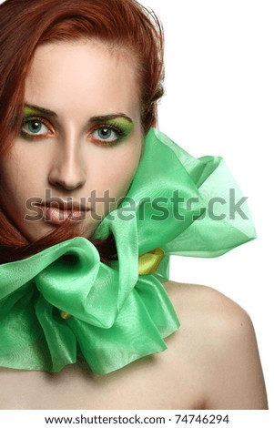 red-haired, green-eyed girl with artistic make-up