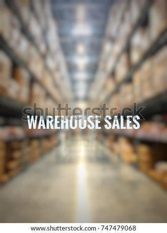 Blurry background of warehouse or storehouse with wording WAREHOUSE SALES.
