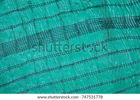 Abstract green mesh visor