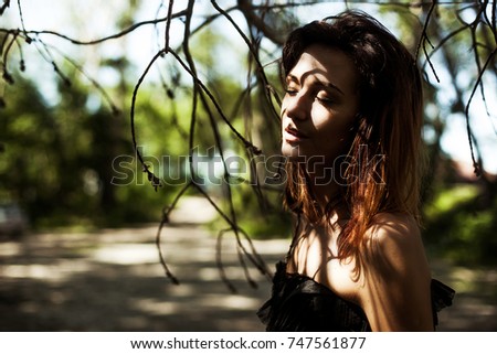portrait of a girl in nature, romatic, femininity and beauty