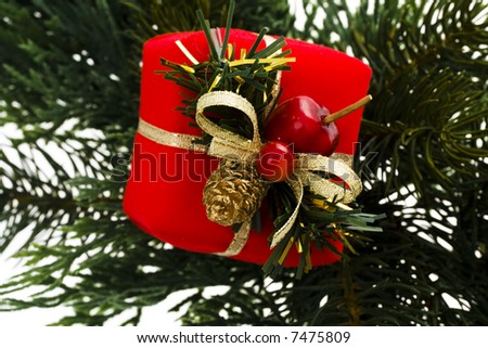 close-up of Christmas present ornament on a garland