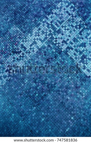 Colorful soft pastel monophonic Venetian mosaic as decorative decoration of facade. Venetian mosaic as decorative background. Selective focus. Abstract pattern. Abstract mosaic ceramic stones