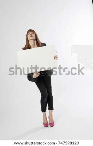 woman holding a sign
