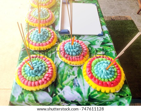 Colorful Krathong multicolor made from bread it food for fish(safe for world concept). Loy Krathong, Thailand Most Beautiful Holiday Festival.