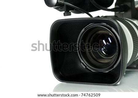 Professional digital video camera, isolated on white background.