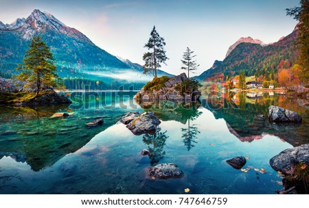 Beautiful autumn scene of Hintersee lake. Colorful morning view of Bavarian Alps on the Austrian border, Germany, Europe. Beauty of nature concept background. Royalty-Free Stock Photo #747646759