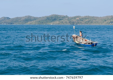 Fishing boat in the sea . Sea evening time background. Fishing boat of Thailand.