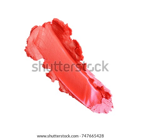 Red color lipstick stroke for make up as sample of cosmetic product isolated on white background