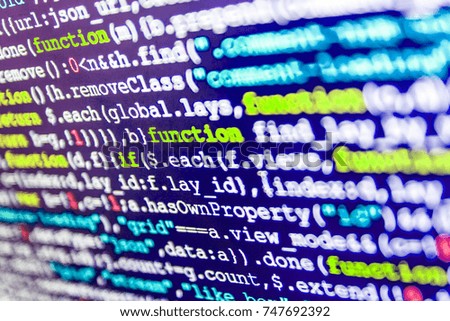 Website HTML Code on the Laptop Display Closeup Photo. Big data storage and cloud computing representation. 
