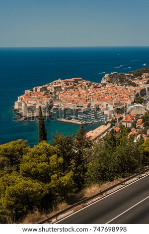 Dubrovnik old town and Adriatic sea, Dalmatia Coast, Croatia, Europe and the road. Picture taken from the mountain trails above Dubrovnik citadel.