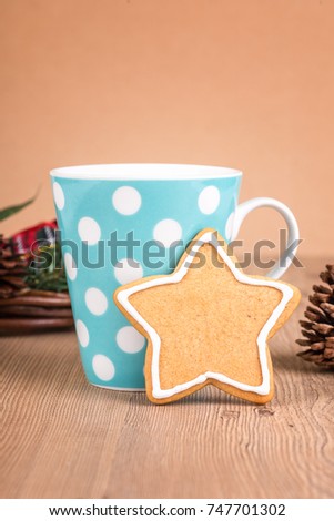 Christmas cookies with decoration /
Still life with decorated Christmas cookies on a wooden background