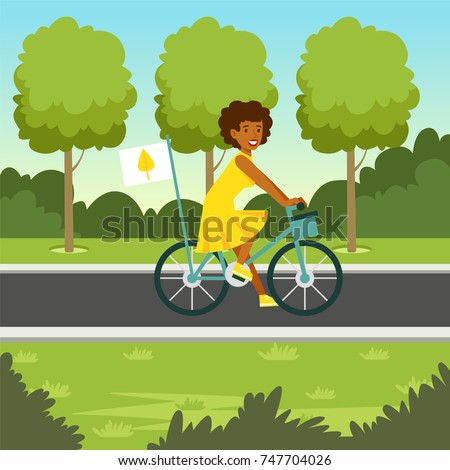 Ecological nature background with girl riding a bicycle