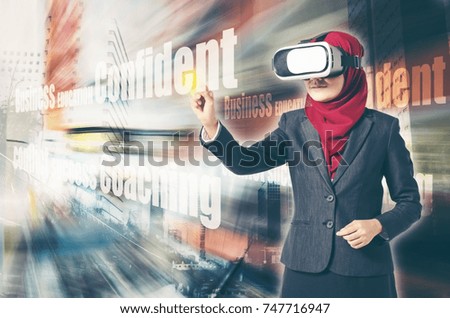 Creative ideas concept, successful young muslimah businesswomen wearing virtual reality headset  over abstract double exposure background
