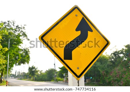 The road ahead curves right, then left, Road symbol signs and traffic symbols for roadway, Yellow board with reflection and concrete post