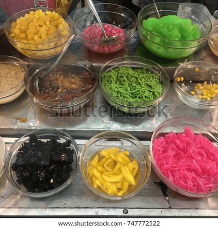 colorful desserts on the street Royalty-Free Stock Photo #747772522