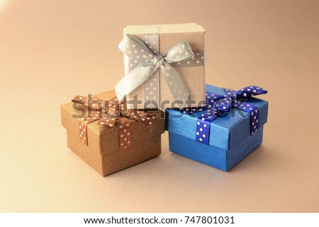 Beautiful gift boxes on a white background. Packing small boxes.