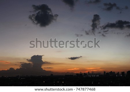 dark blue cloud with white light sky background and city light midnight evening time