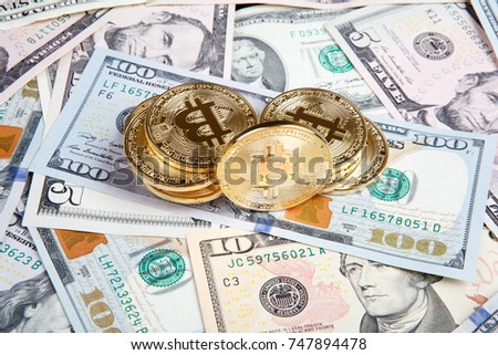 bitcoin coins with dollars