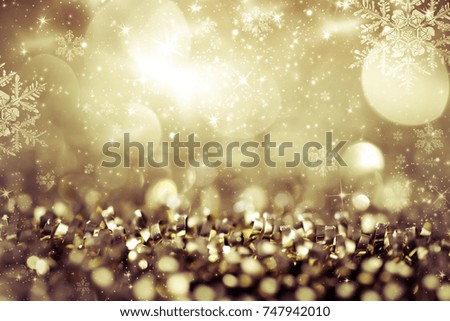 blurred bokeh of Christmas lights. Magic holiday abstract glitter background with blinking stars and falling snowflakes.