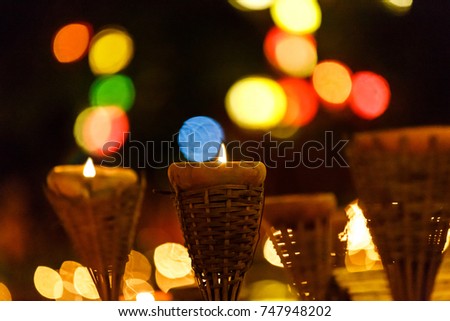 Candle cup in temple at night , Chiang Mai, Thailand