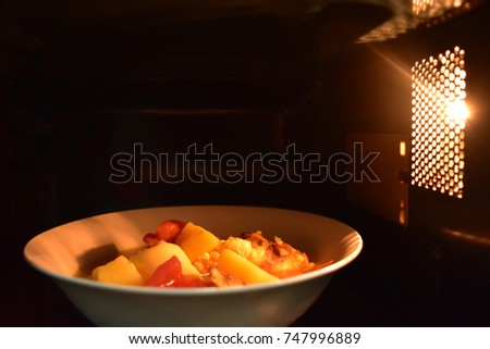 Look inside the microwave food white bowl, In a warm atmosphere and empty top space for text. - Non color ceramic applicable to available with microwave.