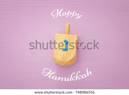 jewish holiday Hanukkah image background with traditional spinnig top.