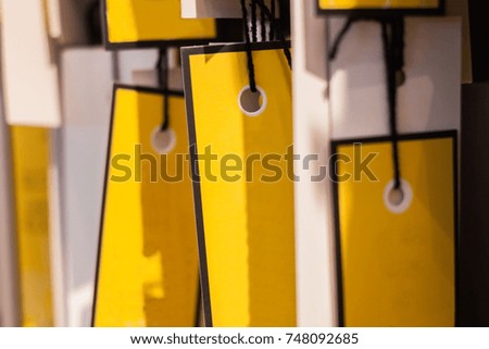 blank paper note  hanging on the rope