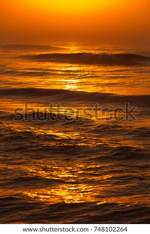 Amazing colorful red sunset over evening sea horizon. Tranquil scene. Natural background. Landscape.