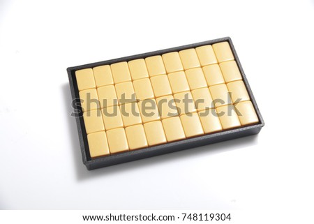 Mahjong in a box on white background