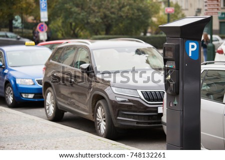 Parking machine with solar panel in the city street. Pay On Foot Parking System