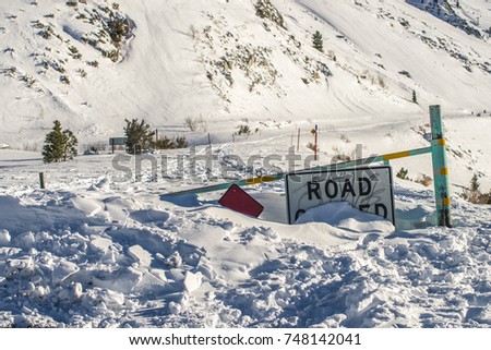 The road in High Sierra Mountains closed due to snowfalls during the winter in California.