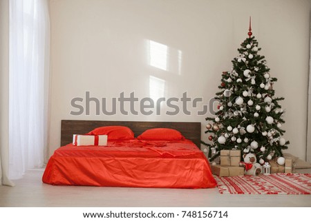 bedroom with Christmas new year tree decoration bed