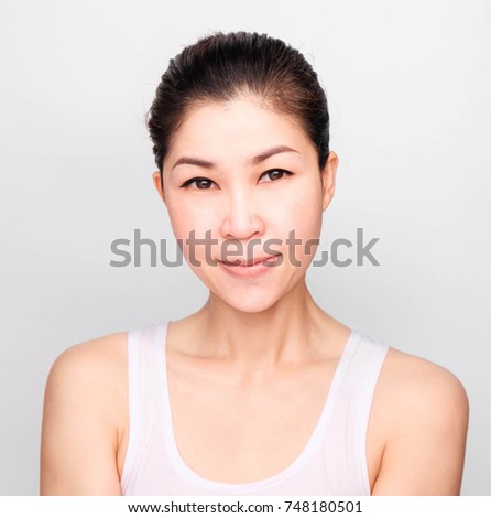 Beautiful woman face with smile for skincare, cosmetic, beauty hygiene, makeup, moisturize,isolated on gray background