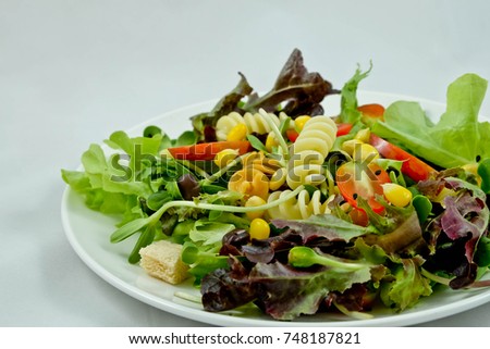 Fresh green salad with tomato
