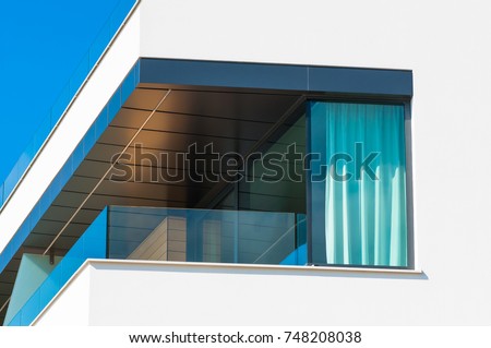 New apartment glass balcony terrace of modern architecture house