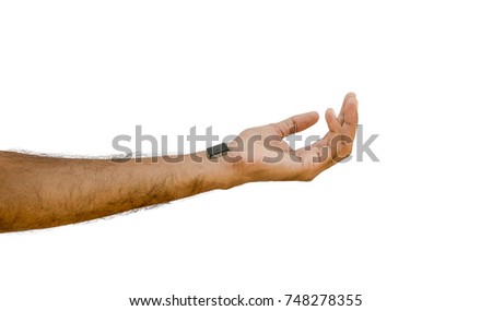 PIcture of a microprocessor chip kept on a male wrist isolated on white background.