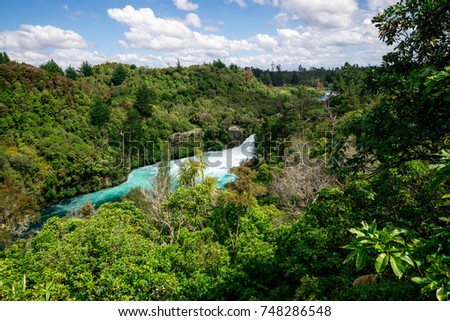 A view of Huka falls on Wiakato river from the distance, New Zealand, Northern Island Royalty-Free Stock Photo #748286548