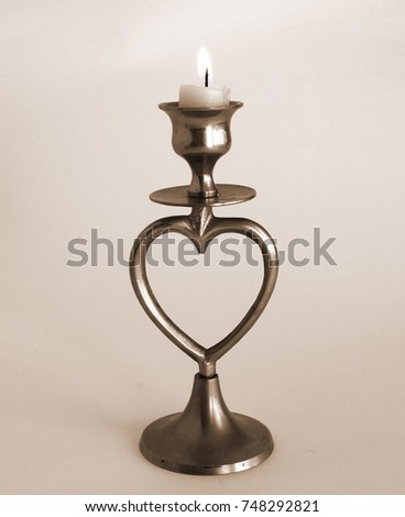 Photo of the antique brass candle holder with sepia effect