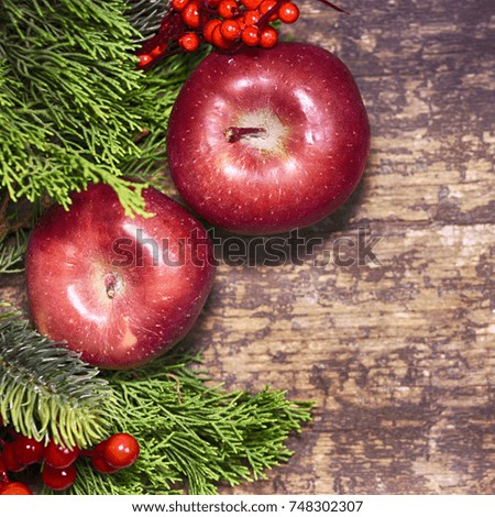 Red apple on the wooden background, Christmas holiday background