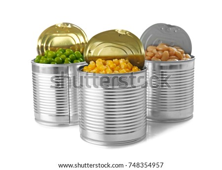 Open tin cans with different food on white background Royalty-Free Stock Photo #748354957