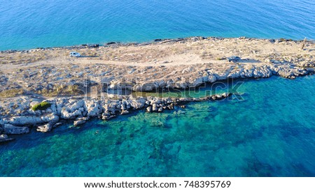 Aerial bird's eye view photo taken by drone of tropical rocky seascape with turquoise clear waters