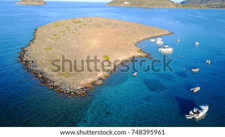 Aerial bird's eye photo taken with drone of famous seascape in Porto Rafti with turquoise clear waters, Mesogeia, Attica, Greece
