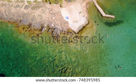 Aerial bird's eye photo taken with drone of famous seascape in Porto Rafti with turquoise clear waters, Mesogeia, Attica, Greece